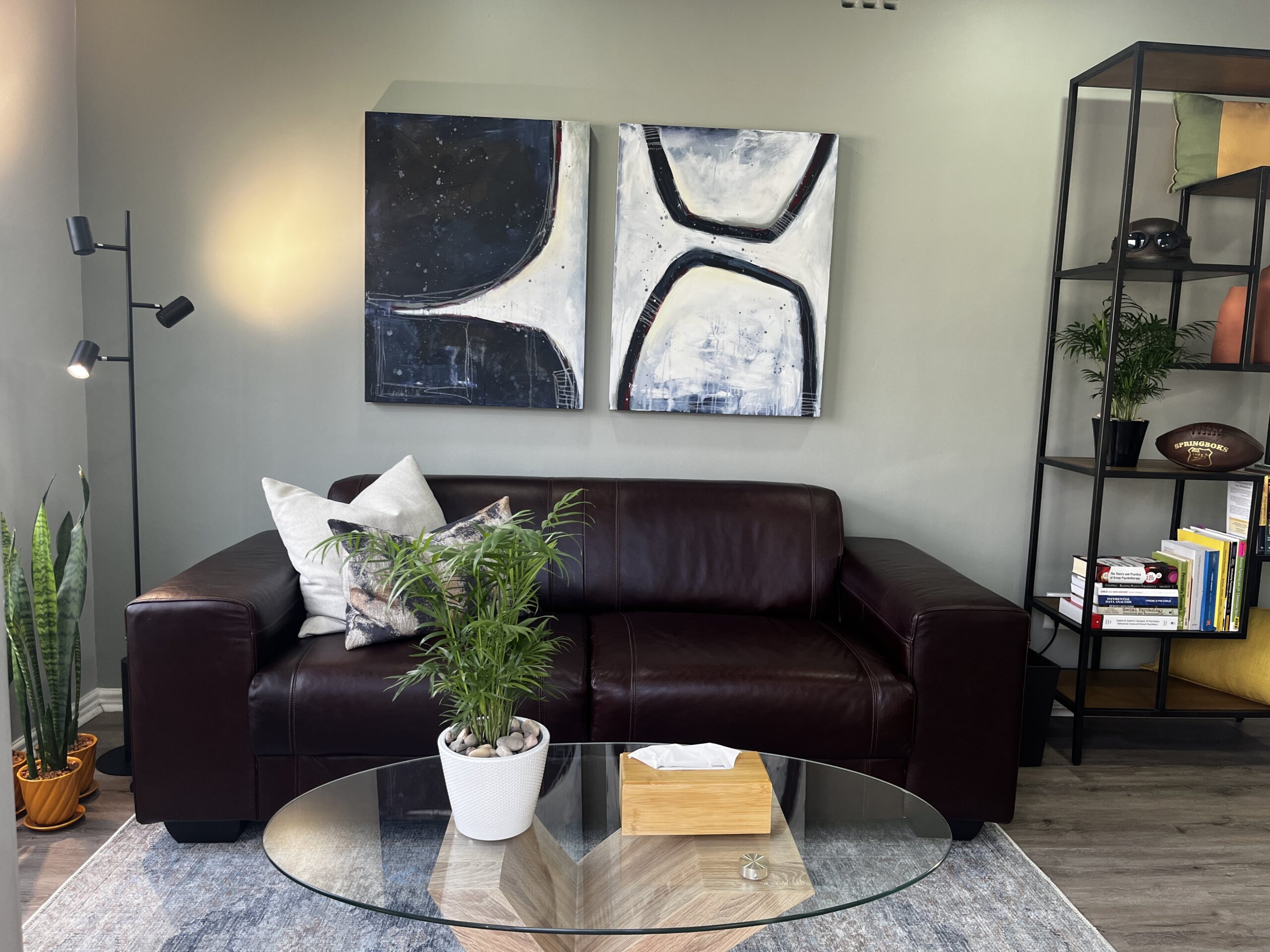 Daniël Luttig Clinical Psychologist - Therapeutic space with down-lights, abstract painting and leather couch  Therapeutic space with down-lights, abstract painting and leather couch - Daniel Luttig Clinical Psychologist